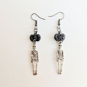 Sparkly Black Pumpkin Topped Skeleton Charm Trapeze Earrings