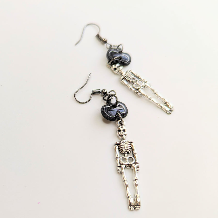 Sparkly Black Pumpkin Topped Skeleton Charm Trapeze Earrings