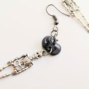 Sparkly Black Pumpkin Topped Skeleton Charm Trapeze Earrings