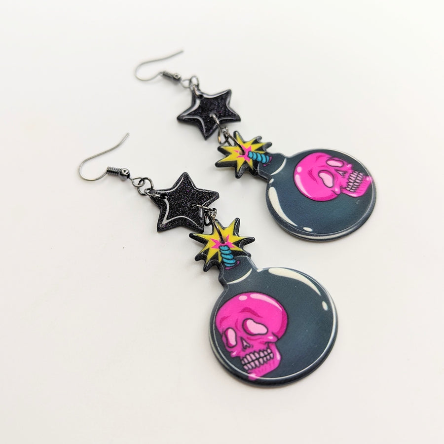 Sparkly Black Star Topped Skull Bomb Trapeze Earrings