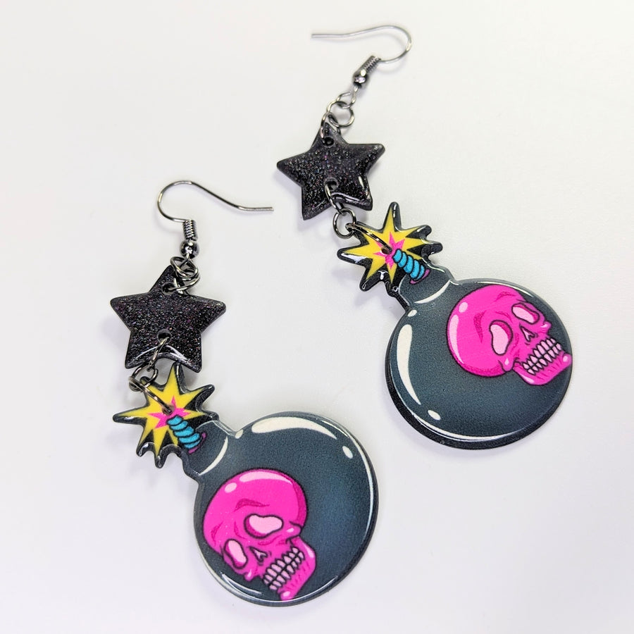 Sparkly Black Star Topped Skull Bomb Trapeze Earrings