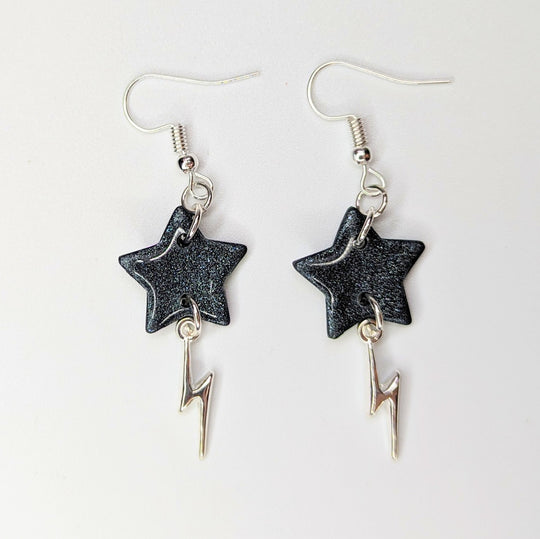 Sparkly Black Star with Lightning Bolt Charm Trapeze Earrings