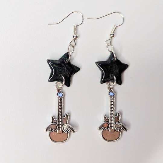 Sparkly Marbled Black & Green Star Topped Winged Guitar Charm Trapeze Earrings