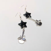 Sparkly Marbled Black & Green Star Topped Winged Guitar Charm Trapeze Earrings