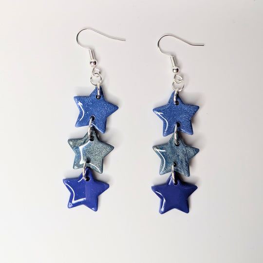 Sparkly Triple Blue Star Trapeze Earrings