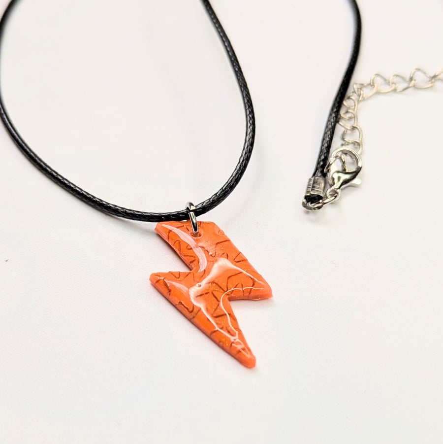 Star Print Orange Lightning Bolt Polymer Clay Star Necklace