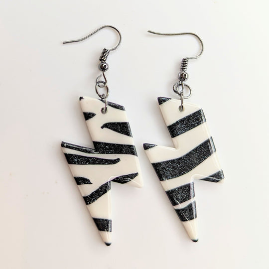 Sparkly Black & White Zebra Print Lightning Bolt Drop Earrings