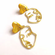 Golden Heart Topped Face Earrings