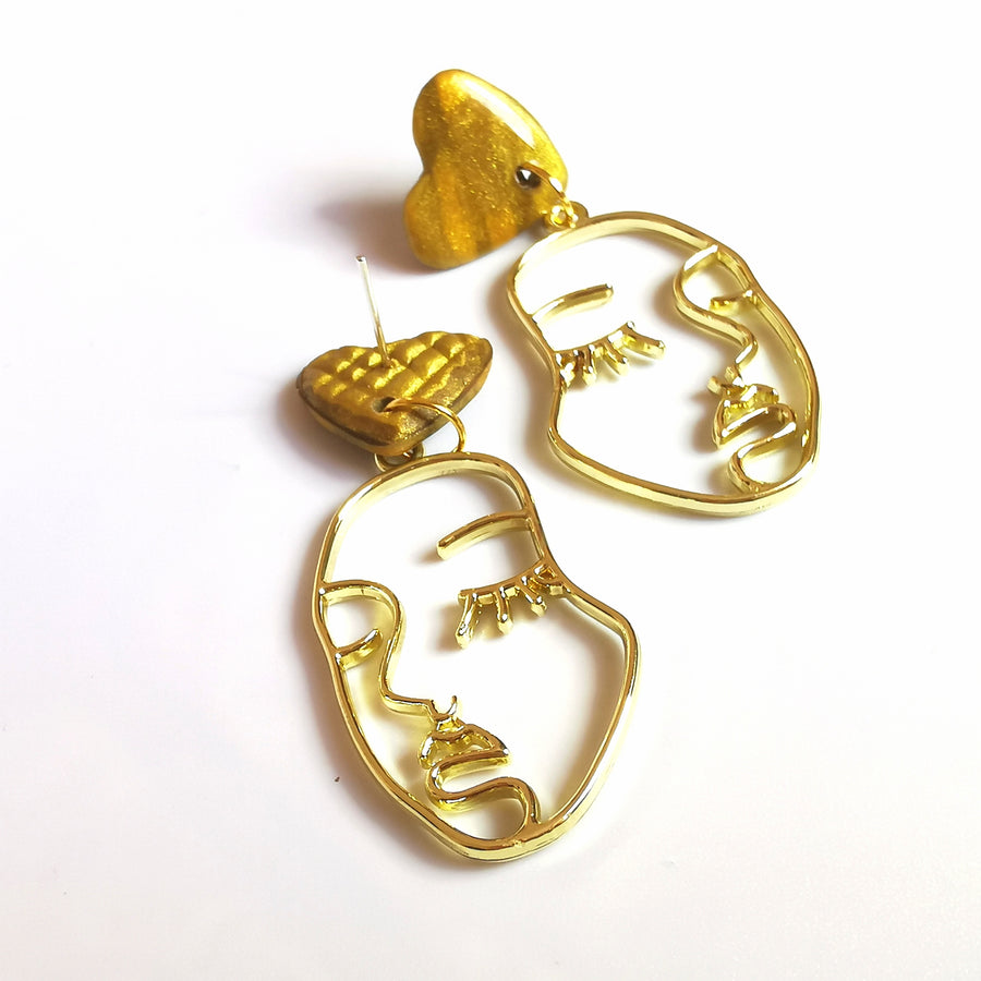 Golden Heart Topped Face Earrings