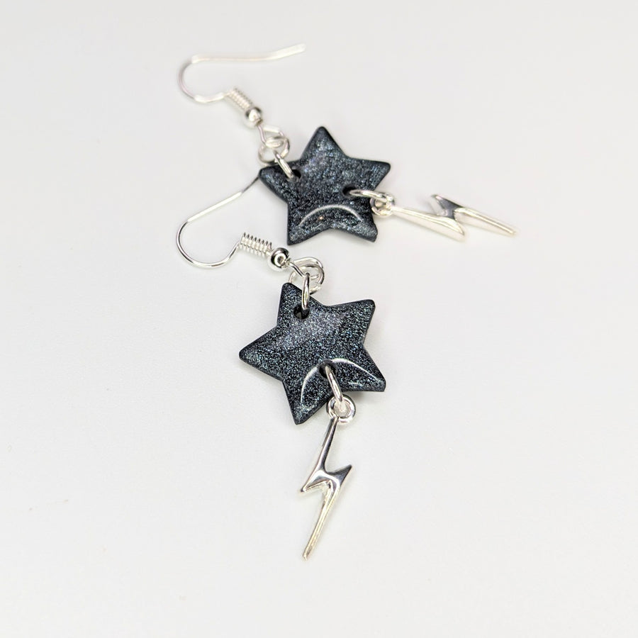 Sparkly Black Star with Lightning Bolt Charm Trapeze Earrings
