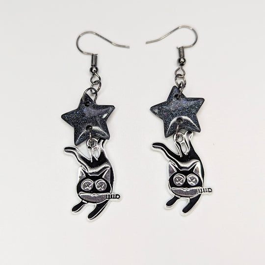Sparkly Black Star Topped Mad Cats Charm Trapeze Earrings