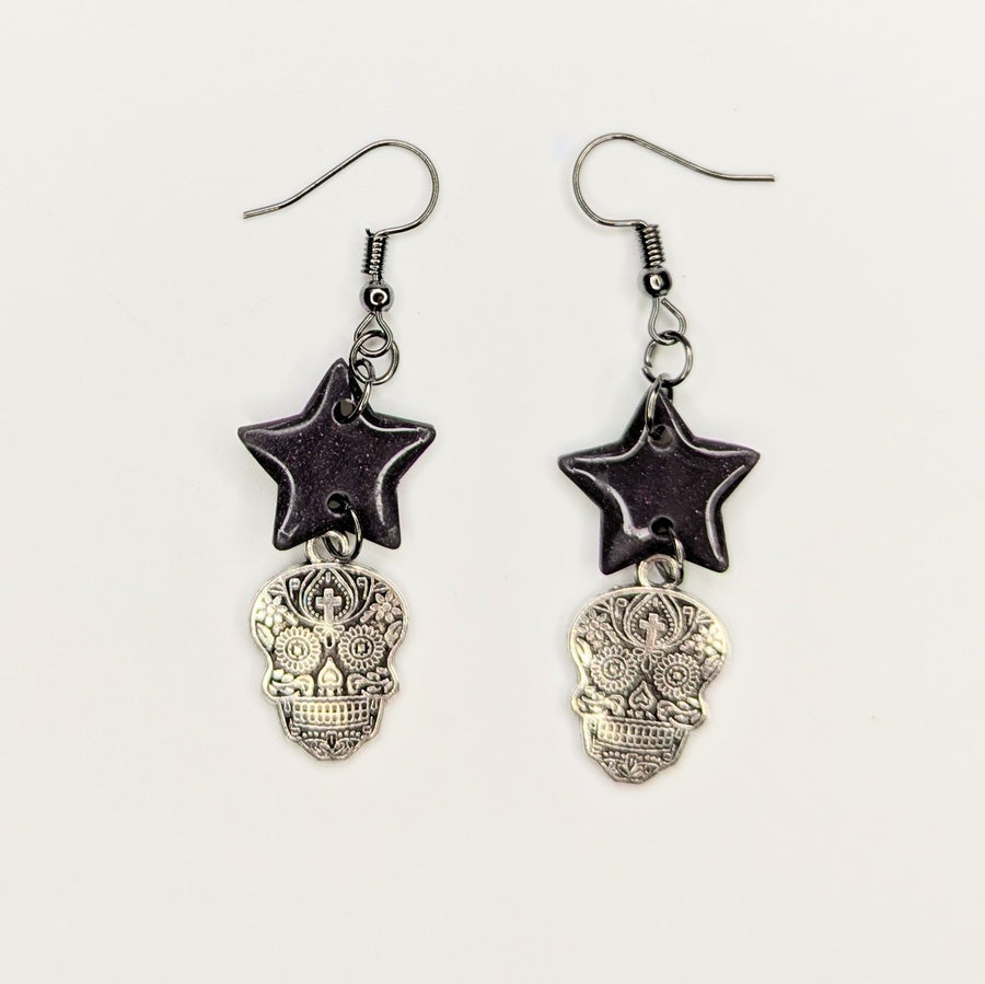 Sparkly Dark Purple Star Topped Candy Skull Charm Trapeze Earrings