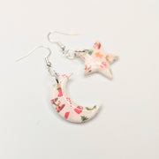 White Christmas Print Star & Moon Drop Earrings