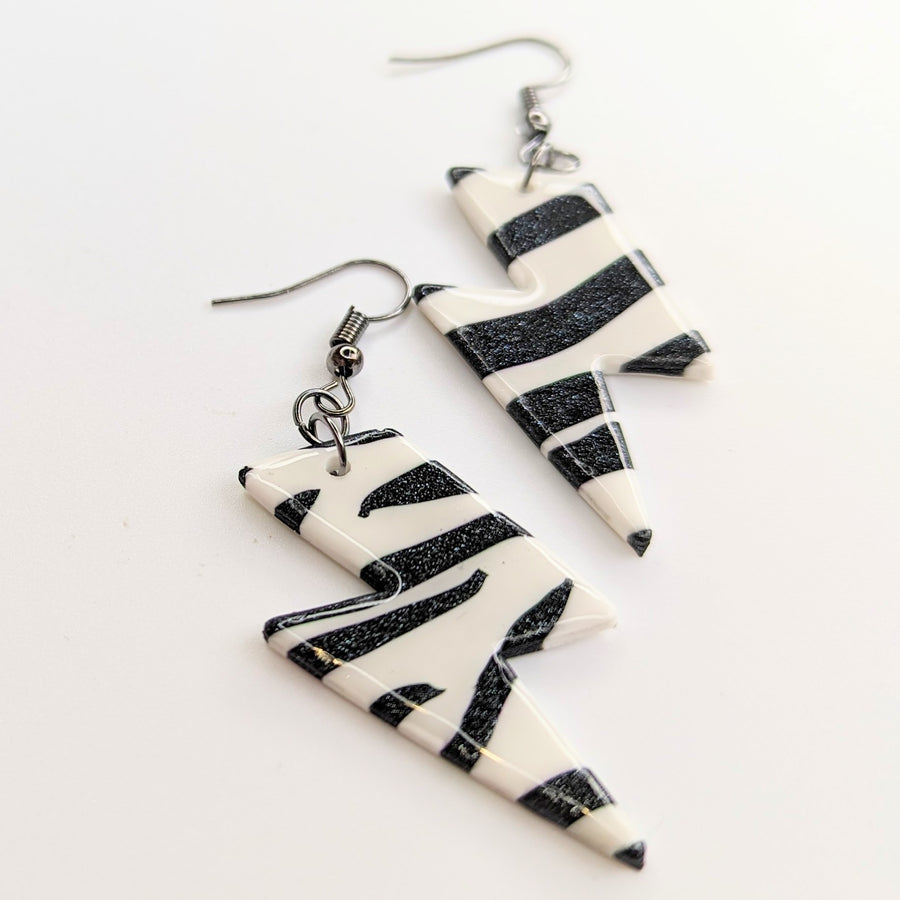 Sparkly Black & White Zebra Print Lightning Bolt Drop Earrings