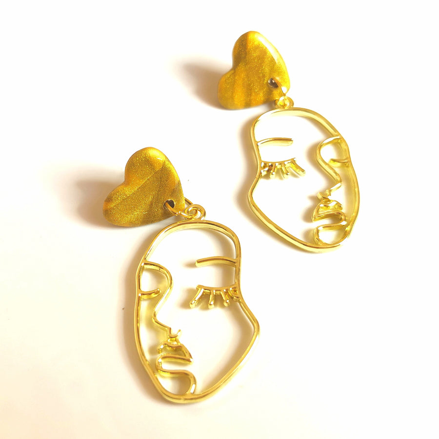 Golden Heart Topped Face Earrings