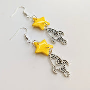 Sparkly Yellow Star with Metal Rocket Charm Trapeze Earrings